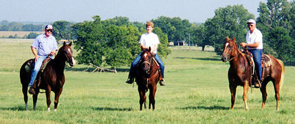 Chris, Sandy, and Bill after moving cattle.